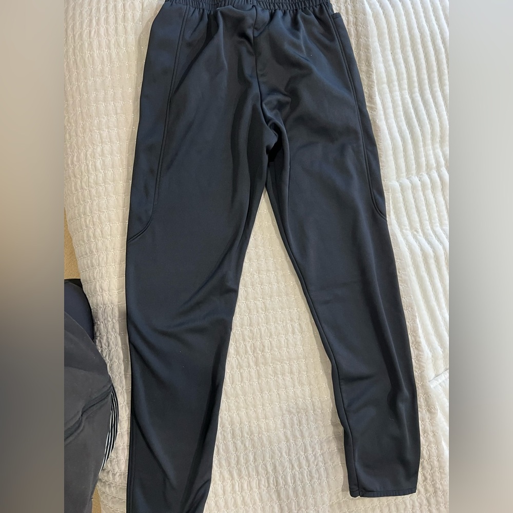 Under Armour. Men’s fleece athletic pant. Loose fit. Black.